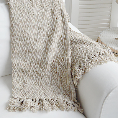 Stowe throws in neutral beige colours  for interiors in New England styles modern farmhouse, country, coastal and city homes from The White Lighthouse. Furniture and home interiors UK - Navy and Herringbone Throw