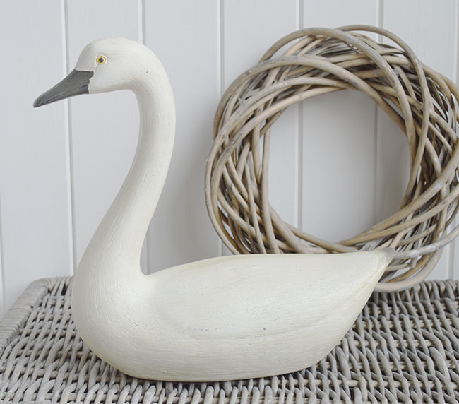 Decorative swan or goose on table for living room interiors.