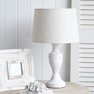 The Rockport table lamp in rustic stone for a coastal vibe in a New England styled interior