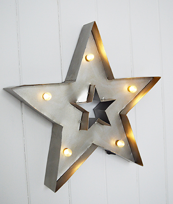 Wall hung silver light up star