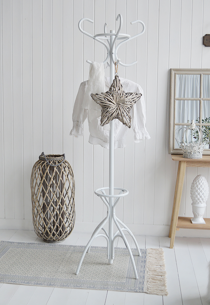 Traditional white coat stand. Hat and coasts rack for New England home and interiors coat storage