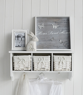 White Wall Shelf with baskets and pegs, such a cute little furnctional piece of hall furniture