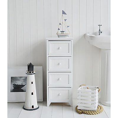 A white narrow freestanding bathroom cabinet, ideal in a bathroom for essential storage of toiletries and make up.A perfect narrow size to fit into slim spaces. Finished in a bright white paint, these four drawer cabinet will suit all styles of bathrooms