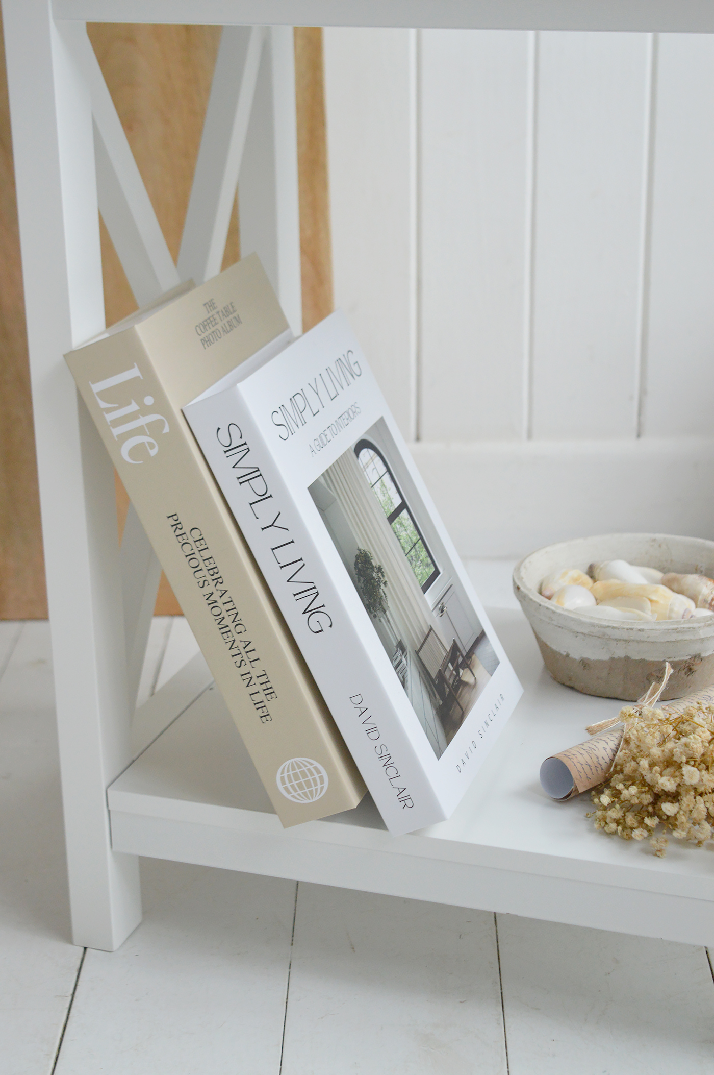 Subtle blue stripes introduce a refined New England influence without feeling themed.