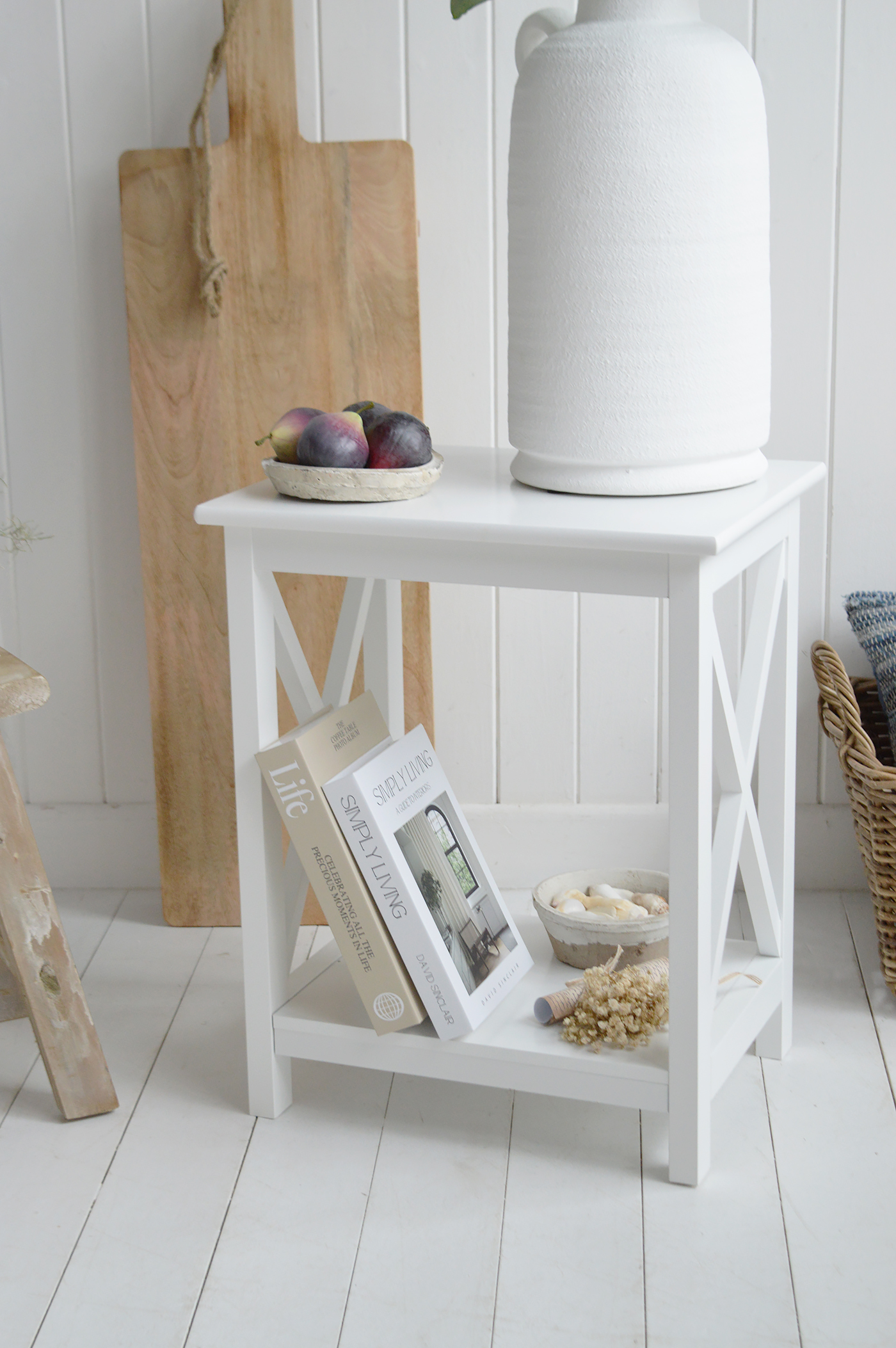 Soft whites paired with warm wood tones bring effortless elegance to modern coastal living.