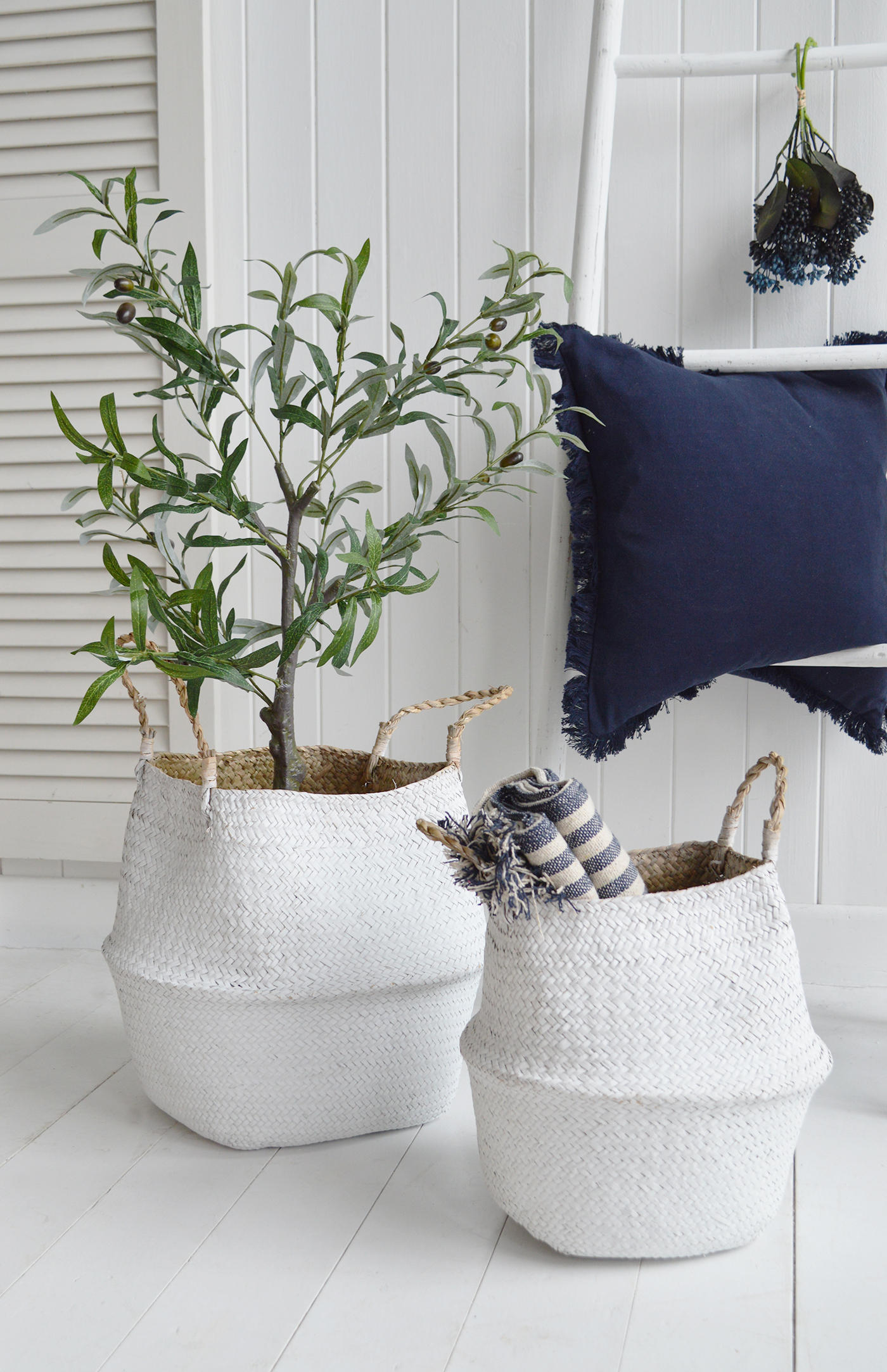 The White Kingston baskets with the faux olive tree and throws