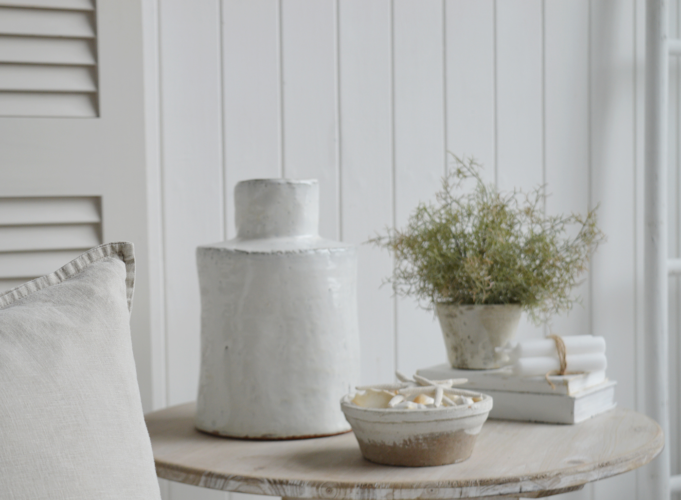 The white betone vase to style coastal New England and Hamptons home interiors