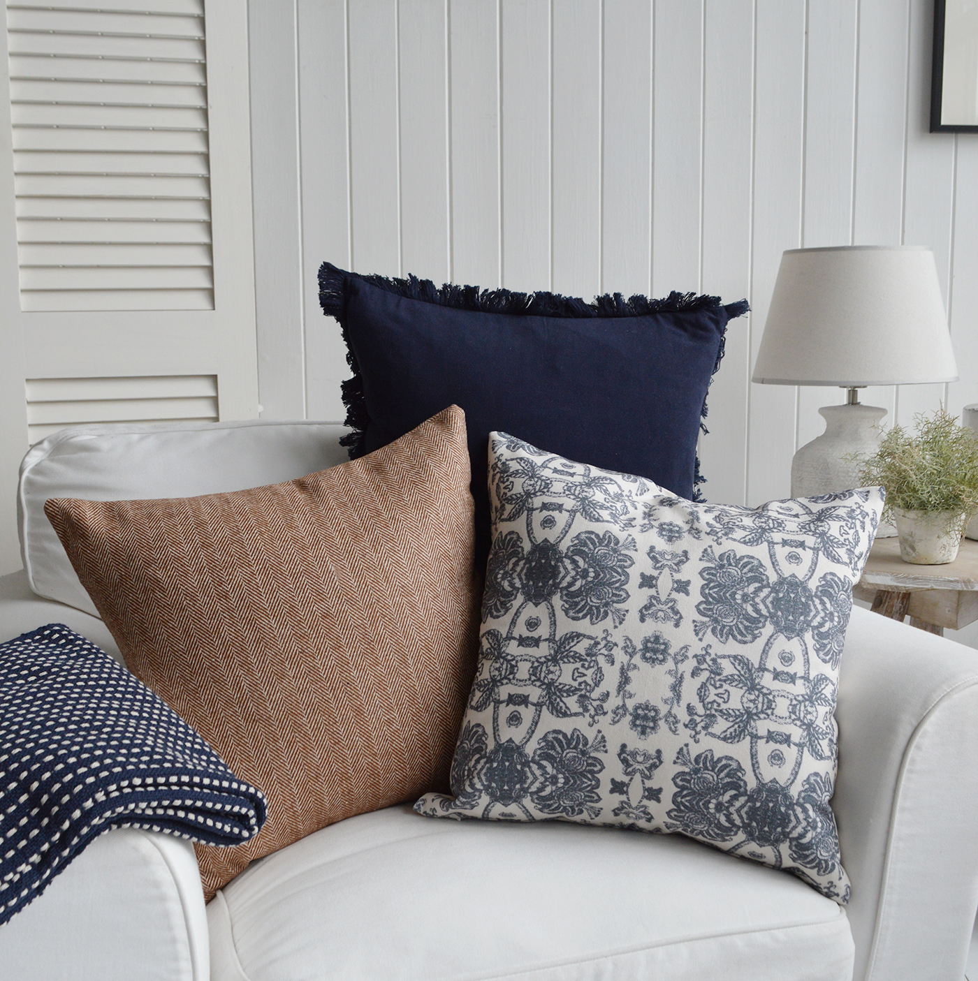 An array of New England and Hamptons Coastal style cushions