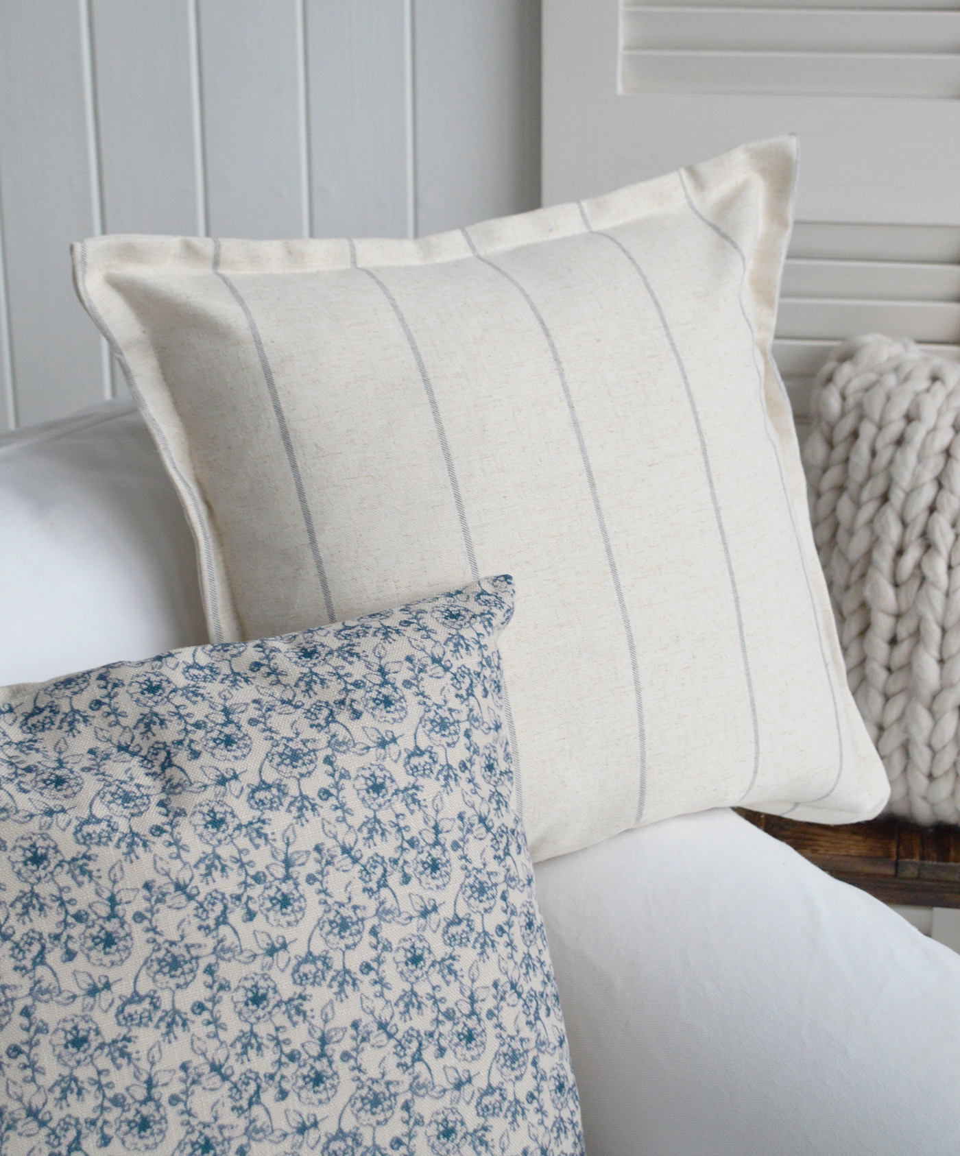 The Lexington cushion covner with simple pinstripe linen Rhode Island for soft furnishings in a coastal home by the sea