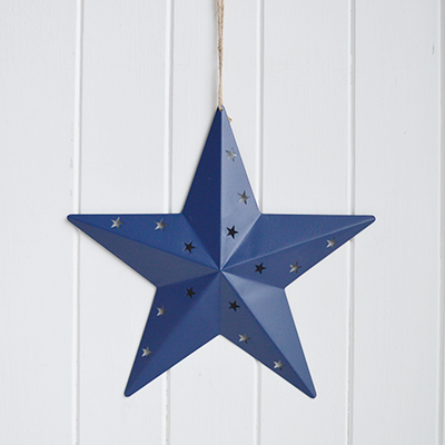 These hanging metal stars are a simple way to add character and texture to coastal interiors and modern country homes.