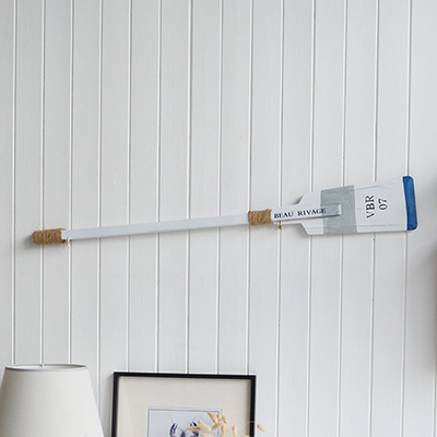 Nautical charm with a refined edge — this decorative oar, painted in classic white and blue, captures the breezy elegance of Newport’s famous harborfront. A perfect accent for beach houses, boathouse-inspired spaces, or maritime lovers.