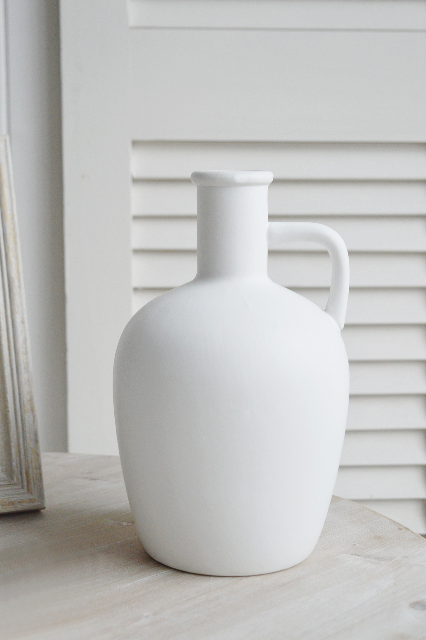 The Prudence white ceramic urn vase for sophisticated New England interiors in coastal or farmhouse homes