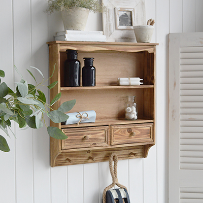 Add rustic charm to your farmhouse interiors with the Woodstock Wall Shelf. Solid wood, shelves, drawers & pegs for timeless country style & storage