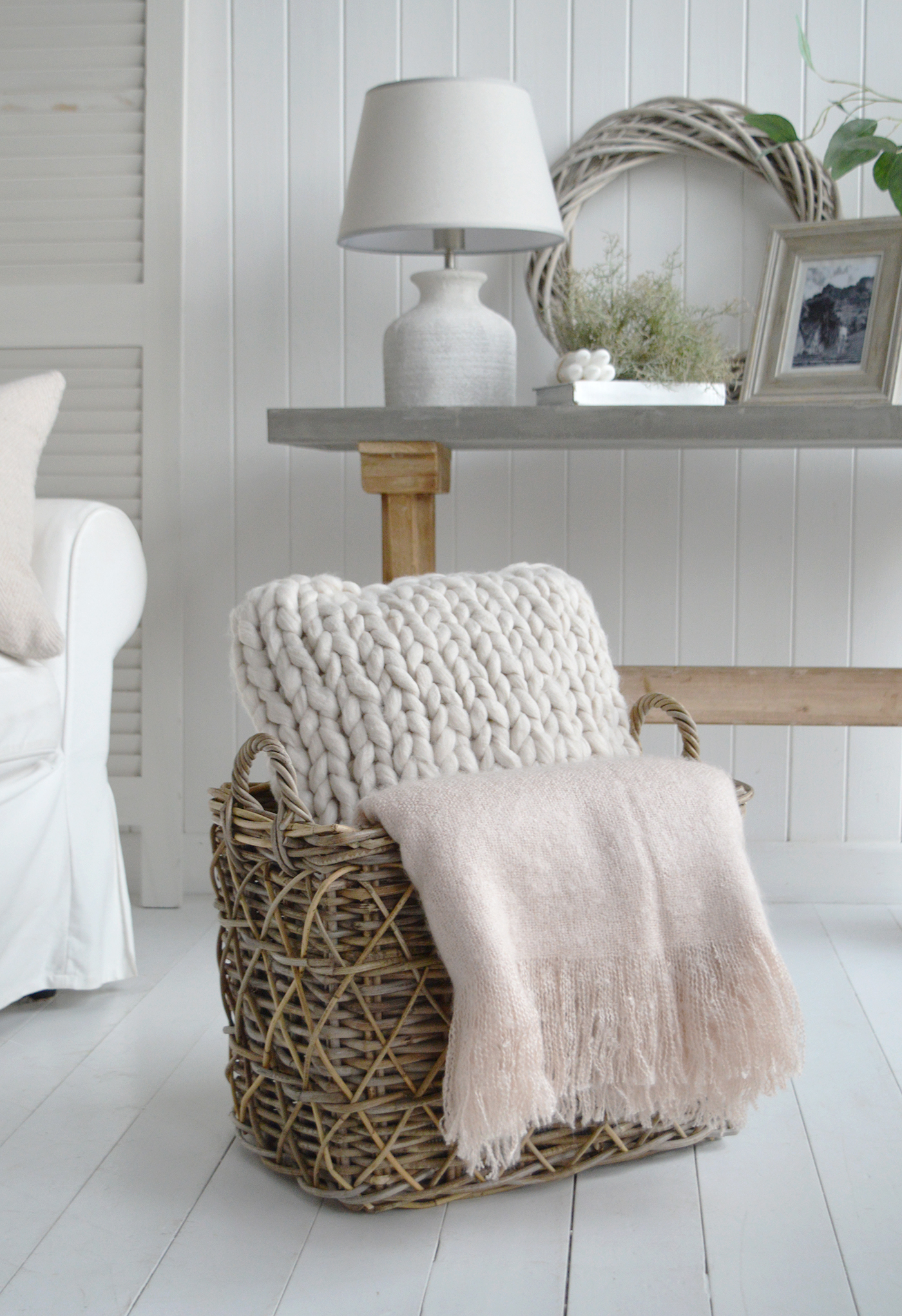 The Casco Bay basket with the pink Whitefirld throw and cushion, as well as being a perfect log basket