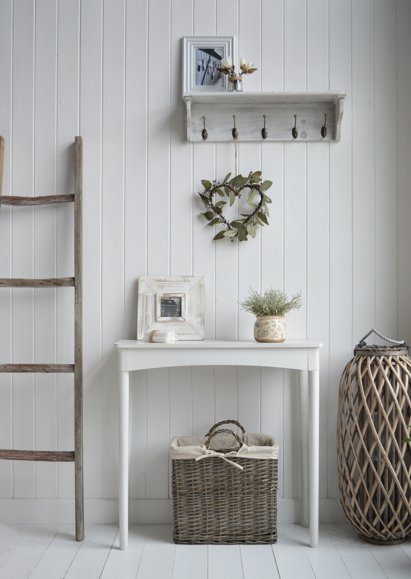 Windsor grey narrow baske under a white console table for New England country, cotthae and coastal homes and interiors