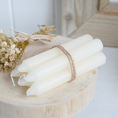     Tied with rustic twine, this bundle of blue candles beautifully complements neutral interiors and coastal home accessories.