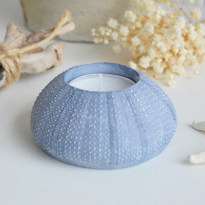 Urchin candle holder - Coffee Table Decor Elegant Coastal New England from The White Lighthouse Home. White Furniture and home decor accessories for the home interiors. New england and Hamptons interiors for luxury coastal home and beach home interiors