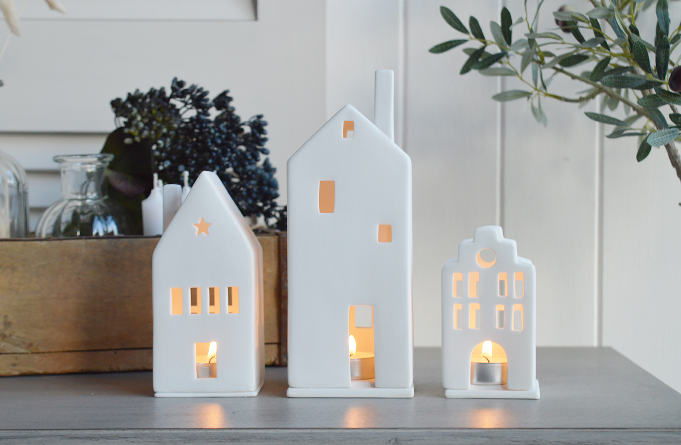 Coastal New England Furniture and decor accessories. Hallway, Living room, bedroom and bathroom. White porcelian townhouse tealight holders