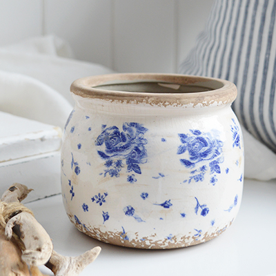 The Willowridge ceramic bowl blenHandcrafted Vintage Blue Rose ceramics with a delicate cobalt floral design and crackle glaze, inspired by coastal New England charm. Perfect for flowers, utensils, or as a rustic cottage accent.ds classic blue and white florals with elegant white ribbed edging for a timeless New England look. Inspired by garden blooms and breezy coastal charm, each piece evokes the serenity of the countryside.">