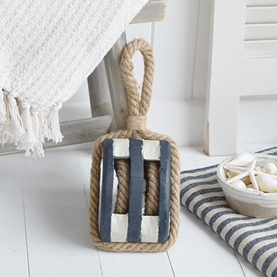 Decorative wooden rope pulley with authentic nautical charm. Perfect coastal décor accent for beach houses, cottages, or seaside-inspired interiors