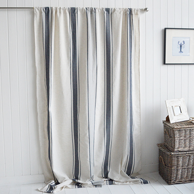 The Cape Shore Stripe Curtain brings cool coastal ease with navy and slate stripes on a soft linen base — perfect for fresh, relaxed seaside interiors.