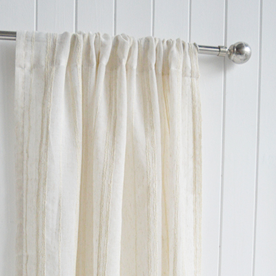 The Ivory Haven Stripe Curtain features soft ivory tones and a subtle textured stripe, perfect for neutral interiors, New England style homes and relaxed, timeless living spaces.