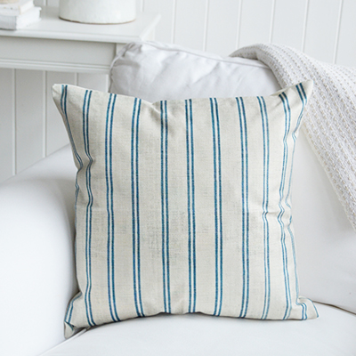Bring a touch of timeless coastal style to your home with the Alton Cushion, featuring woven oyster linen and classic ocean blue stripes – perfect for Hamptons, New England, and modern beach house interiors