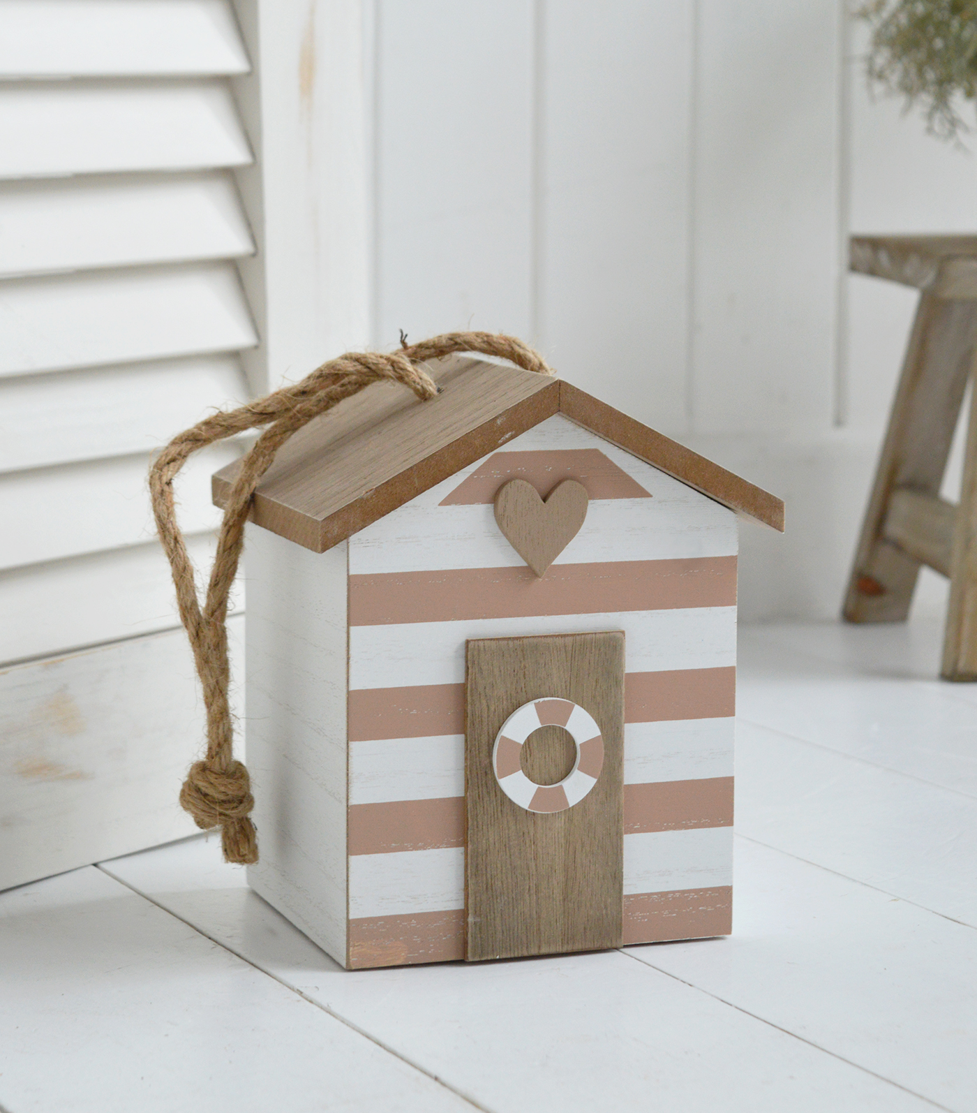 A striped Beach Hut Doorstop, coastally quirky inspired door stops for New England beach house inspired homes and interiors