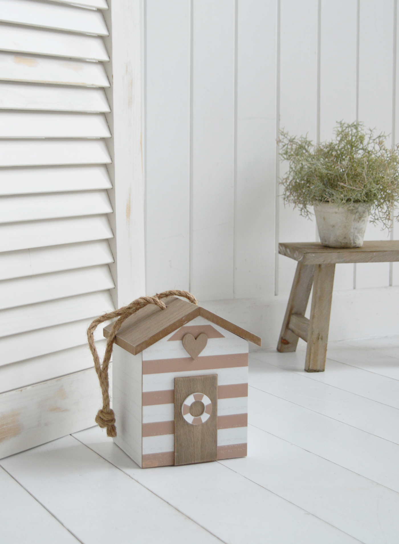 A striped BeachHut Doorstop, coastally quirky inspired door stops for New England beach house inspired homes and interiors