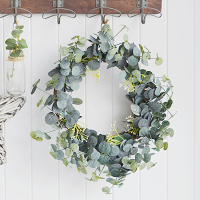 A very realistic, natural and beautiful looking Eucalyptus wreath with twigs for adding greenery to your home. 							  Ideal as a centre piece on a table or can be hung from a wall.