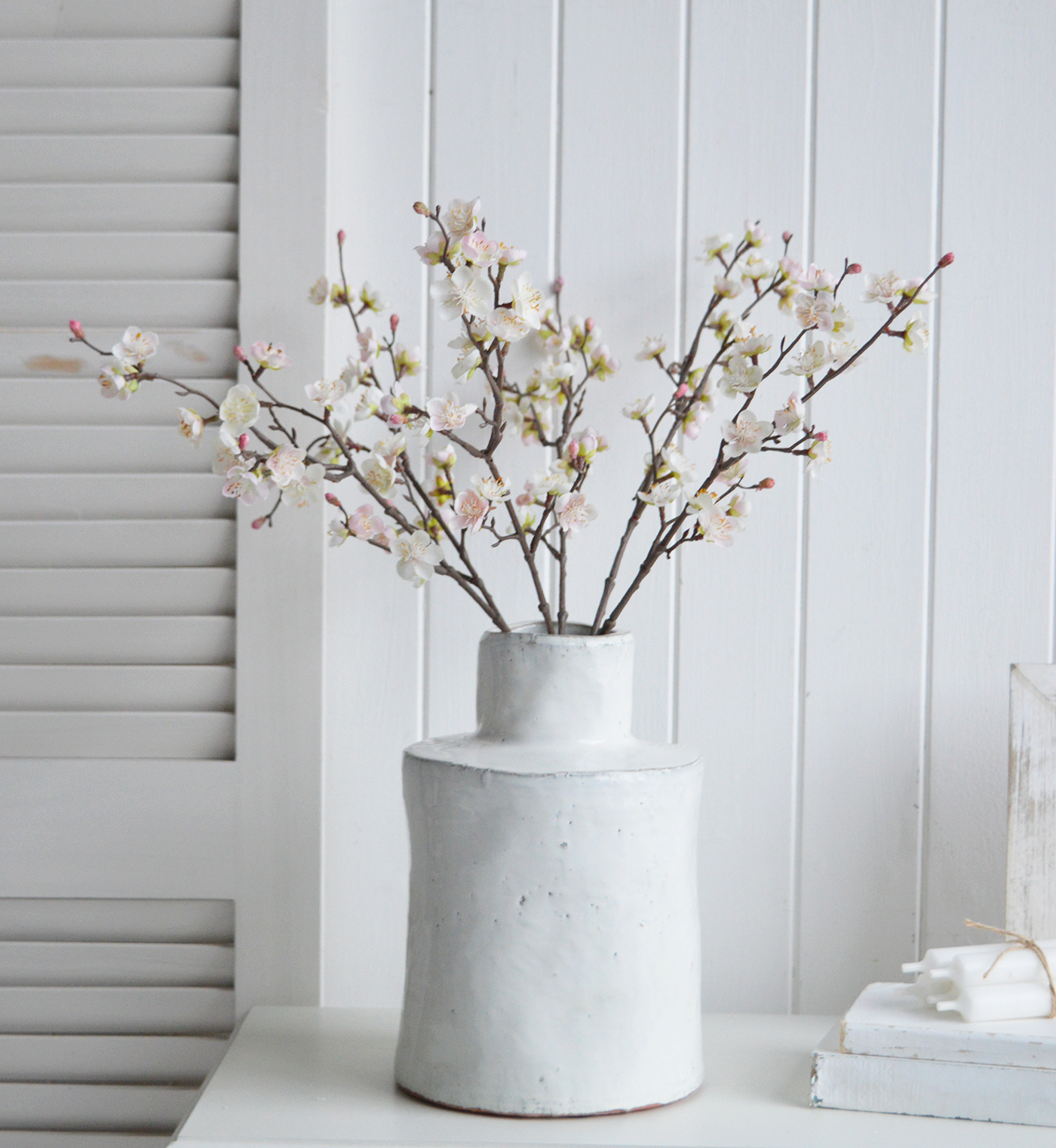 Faux blossom srpay stem for styling a peaceful and serene timeless New England coastal interior