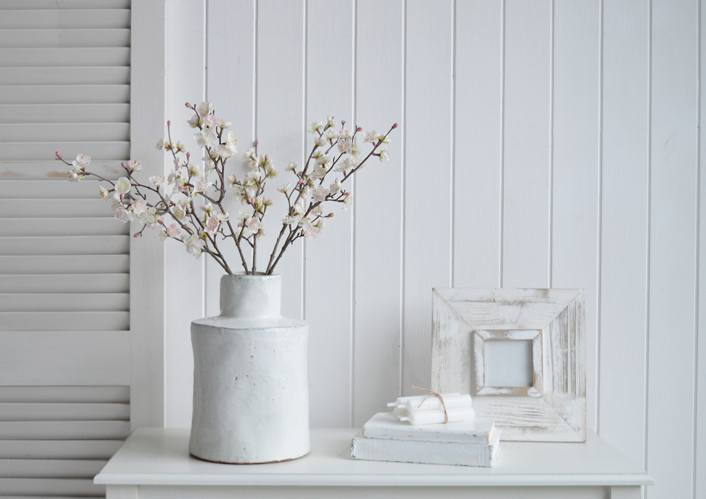 Faux blossom srpay stem for styling a peaceful and serene timeless New England interior