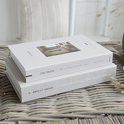 Perfect for coastal interiors, these neutral decorative books complement whitewashed woods, soft linens and relaxed, light-filled living spaces..