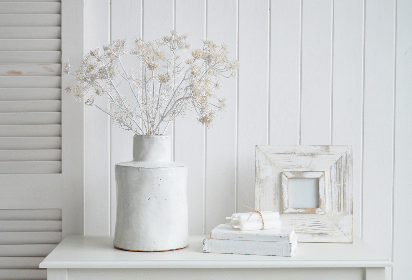 White foilage to style a peaceful and calming white home, ideal for timeless New England interiors for both coastal and farmhouse homes