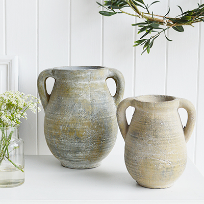 A rusctic grey stone jar with handles. Vintage charm and texture are in abundance with our beautiful piece of stoneware. In a grey stone finish, it is perfect to fill with our faux Eucalyptus or olive stalks. 