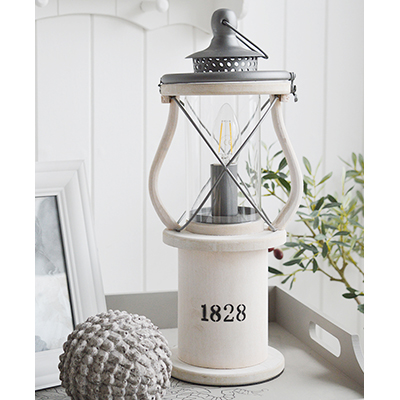 The Lewiston is a charming Victorian white wooden lantern table lamp.

Perfect vintage styling for a New England styled home in the living room, hallway or bedroom.