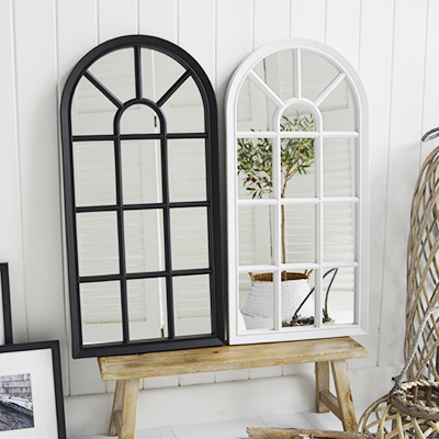 Nautical and white wall mirrors. New England home The White Lighthouse ...