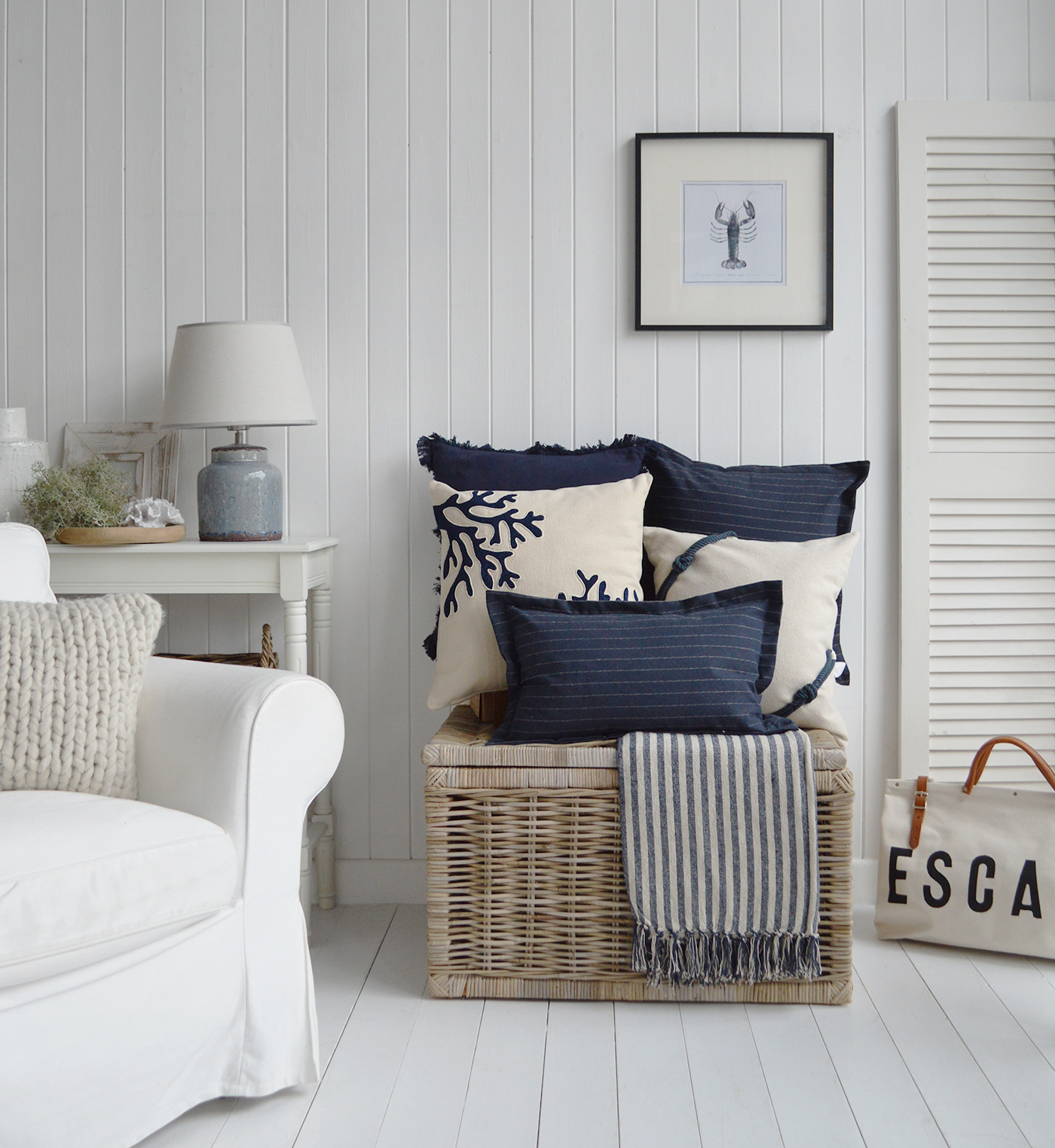 Navy cushions for furnishing a beachhouse. The Navy Peabody, Nantusket and rope cushion covers along with the navy Mapleton throw