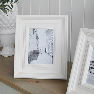 A chunky white wood photo frame for photos in a distressed white beach house finish.

In two sizes for either 6 x 4 photographs and 5 x 7, the photo frames can be used for portrait or landscape photographs.

Designed to complement all our New England style interiors for country, coastal and city homes