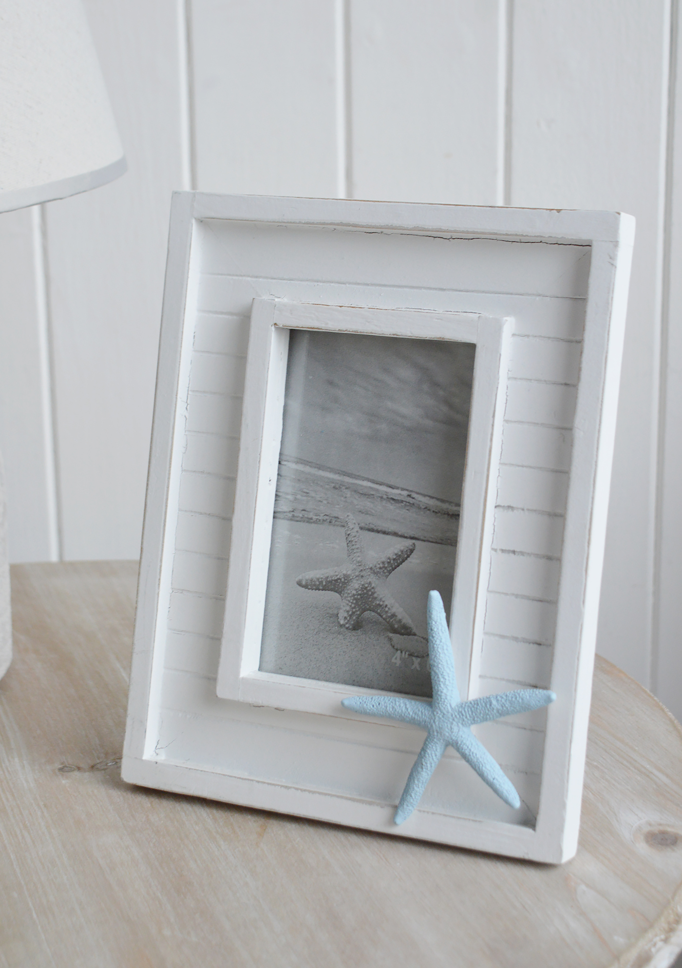 White coastal wooden clapboard photo frame