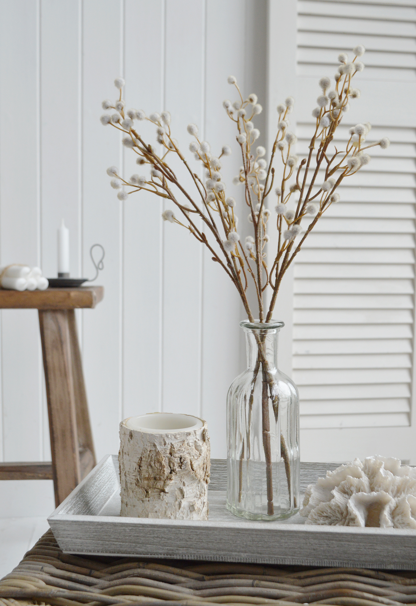 Faux Pussy Willow as coffee table decor in a coastal inspired home