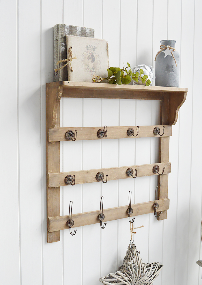 Pawtucket wooden wall shelf with hooks in greyed wood for the living room, bathroom, hallway or bedroom. Perfectly complements coastal, country and white furniture in New England Interiors and homes from The White Lighthouse, ideal for coat storage