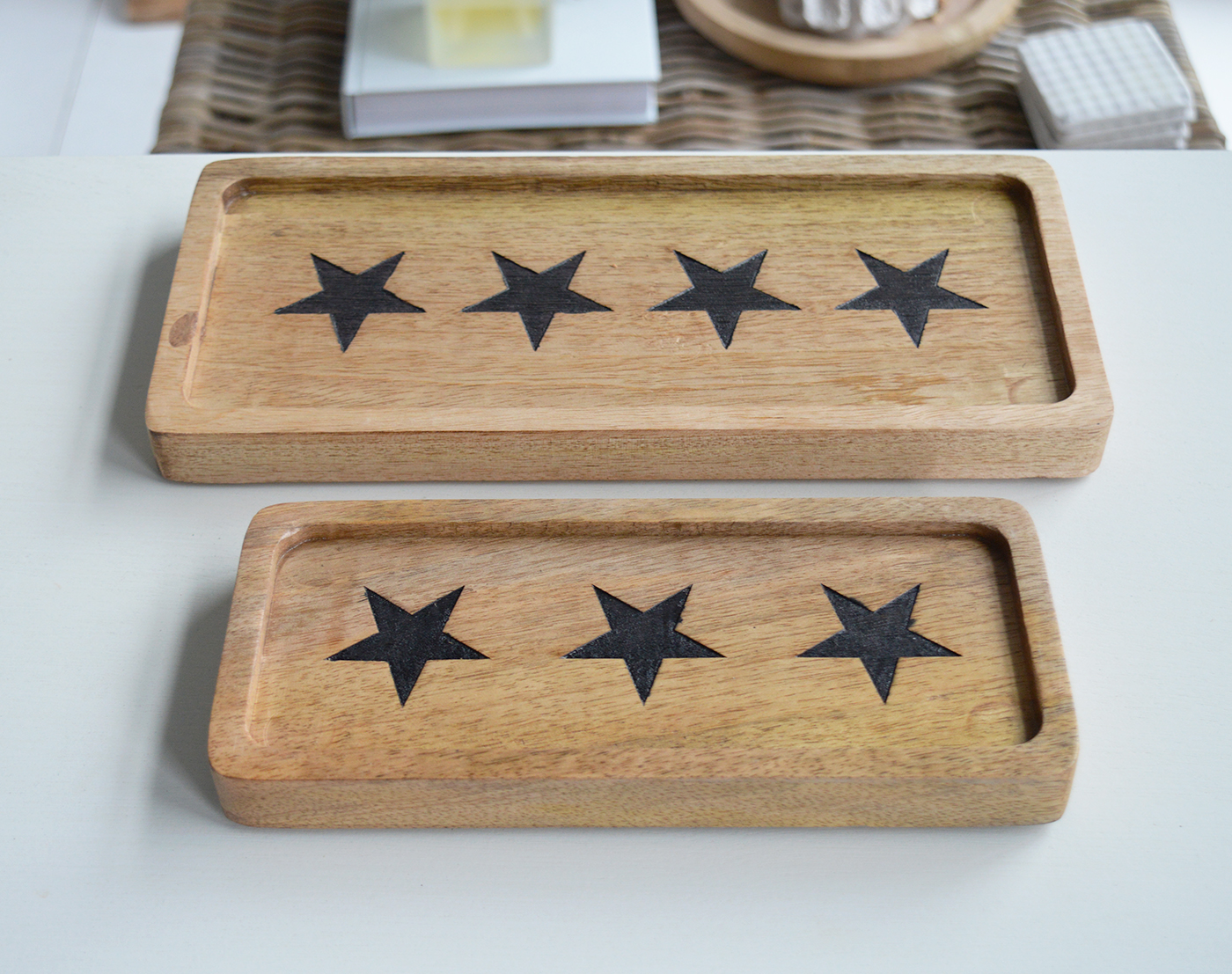 A wooden tray with stars, perfect for serving in A New England styled home coastal or farmhouse interior