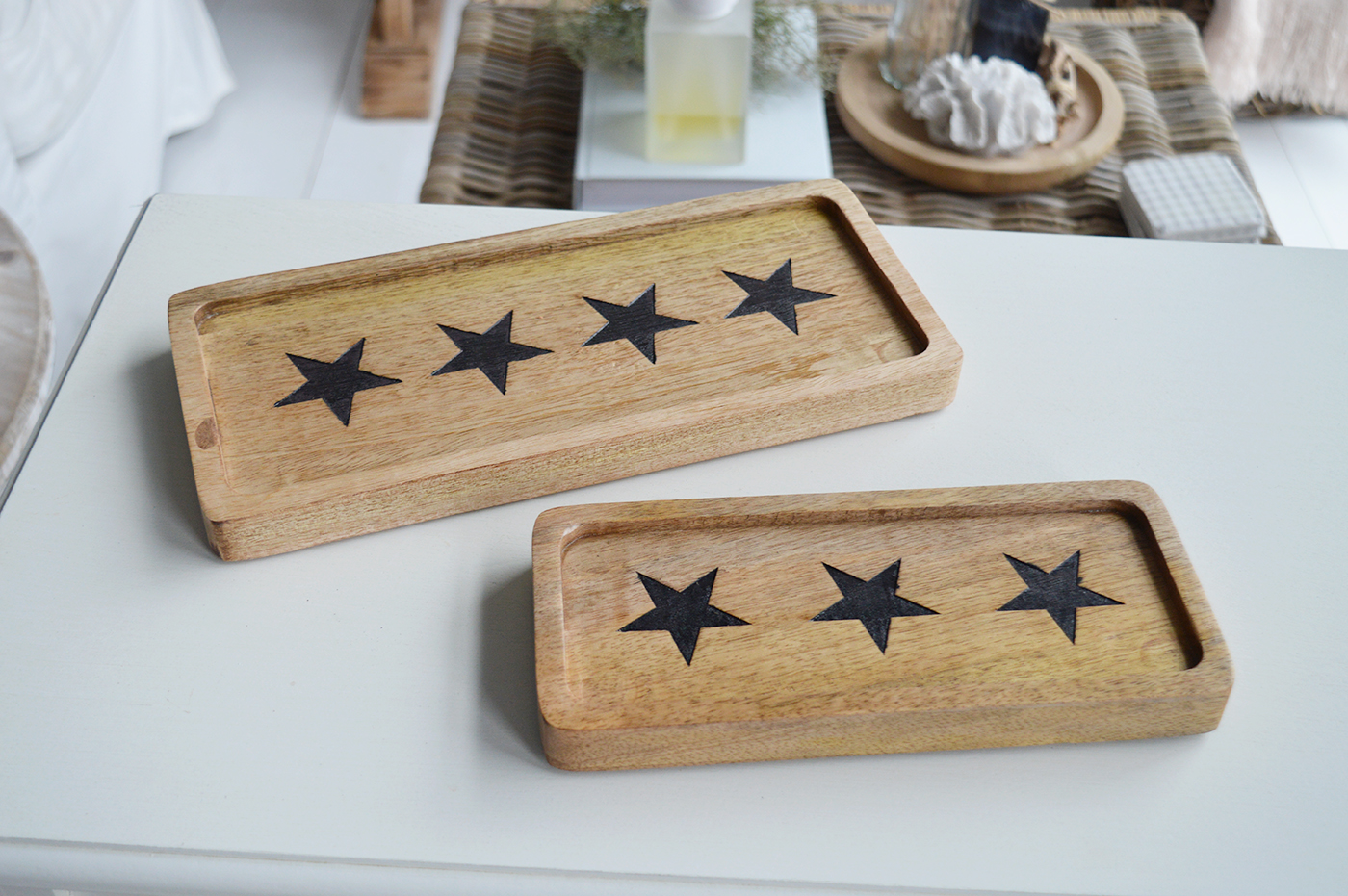 A wooden tray with stars, perfect for serving in A New England styled home