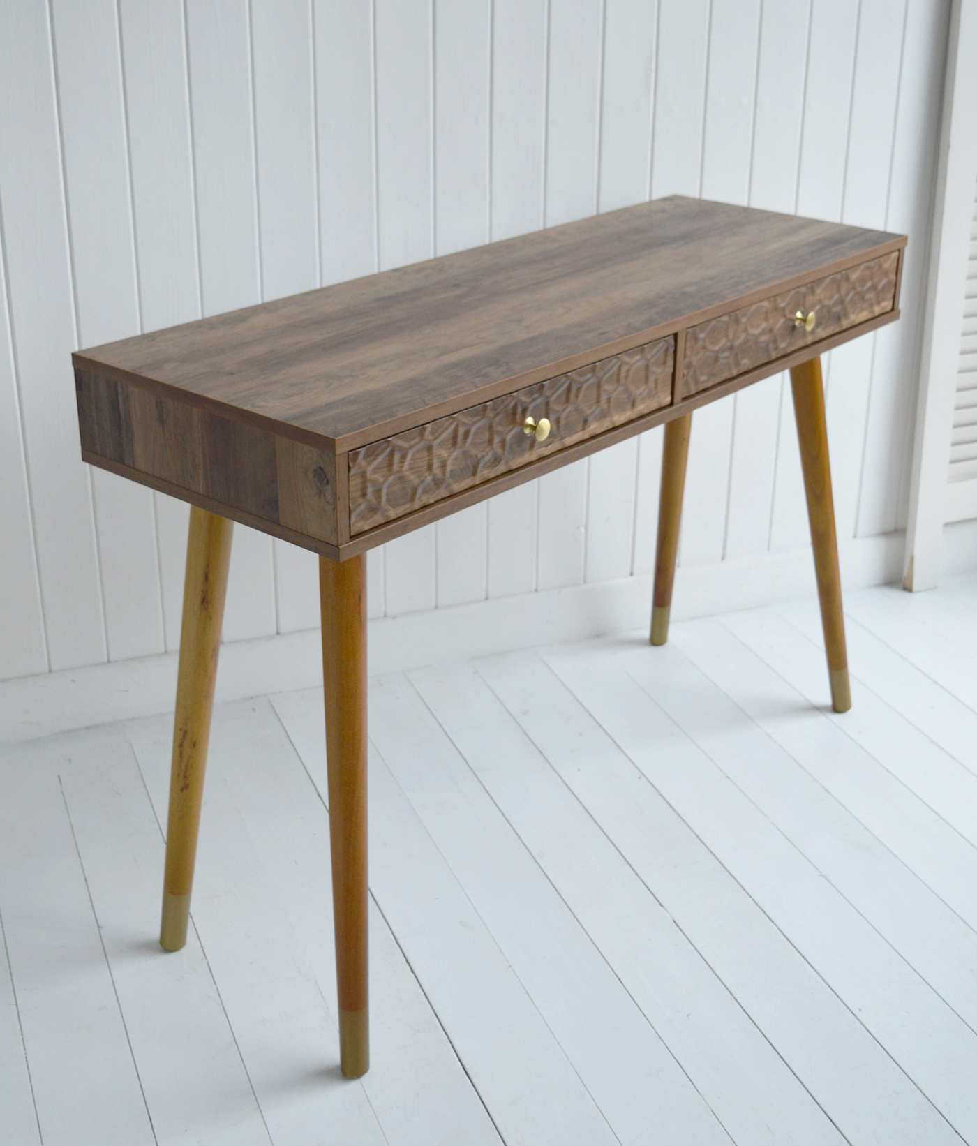 The Windsor console table with two drawers. With a minimal simple design, the Windsor table exhibits organic charm with the wood veneer finish along with rustic texture and warmth from the rippled drawers