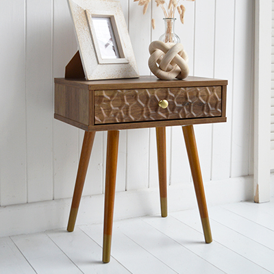 The Windsor console table with two drawers. With a minimal simple design, the Windsor table exhibits organic charm with the wood veneer finish along with rustic texture and warmth from the rippled drawers for coastal interiors