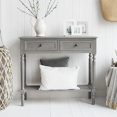 The Sudbury Console Table reflects the essence of coastal furniture, with clean lines and a finish inspired by driftwood tones.