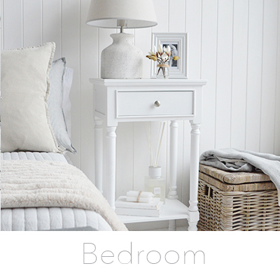 New England white bedroom furniture, bedside tables, cabinets, dressing tables, ideas for decorating a white bedroom in a laid back style.