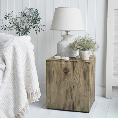 The Boothbay Table adds depth and character to coastal interiors with its realistic textured wood-effect finish and timeless design.