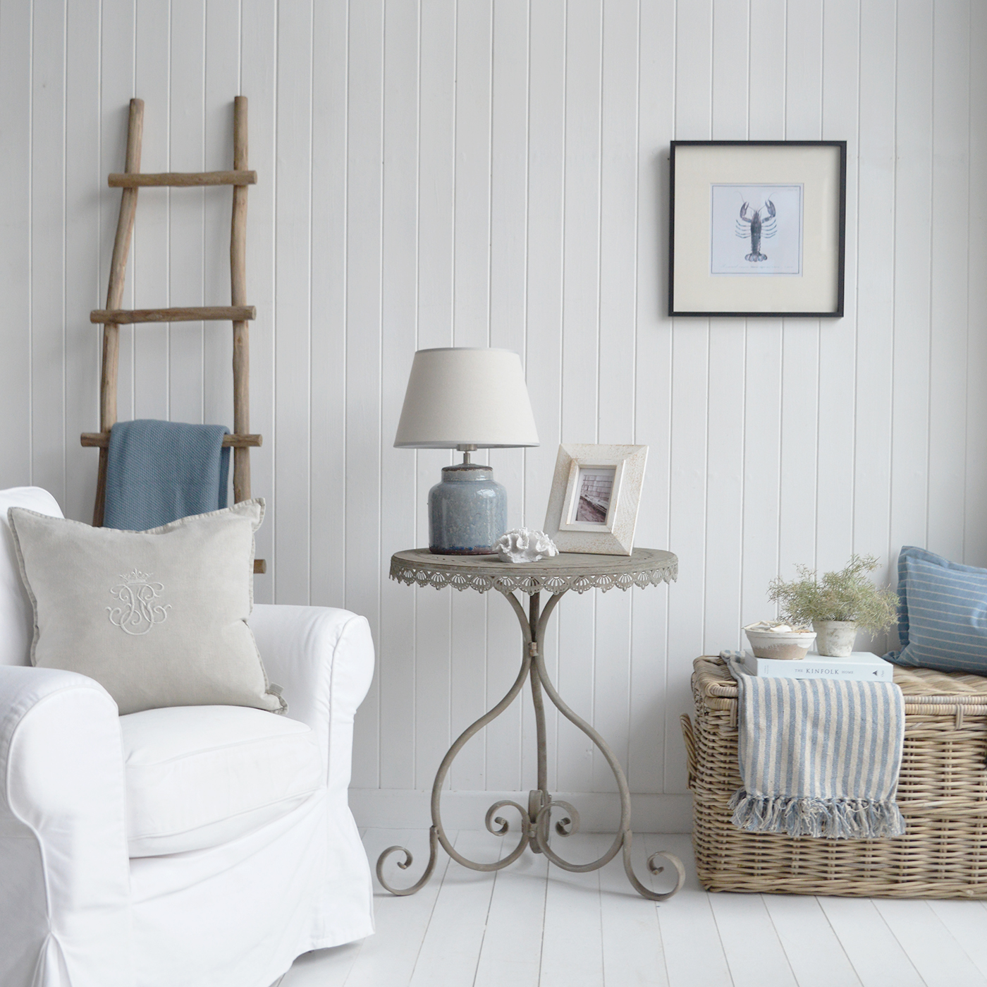 Whether in a seaside cottage or a countryside farmhouse, the Charleston Grey Table along with the pale blues in the lamp and soft furnishings offer foundation for everyday living and styling modern coastal interiors.